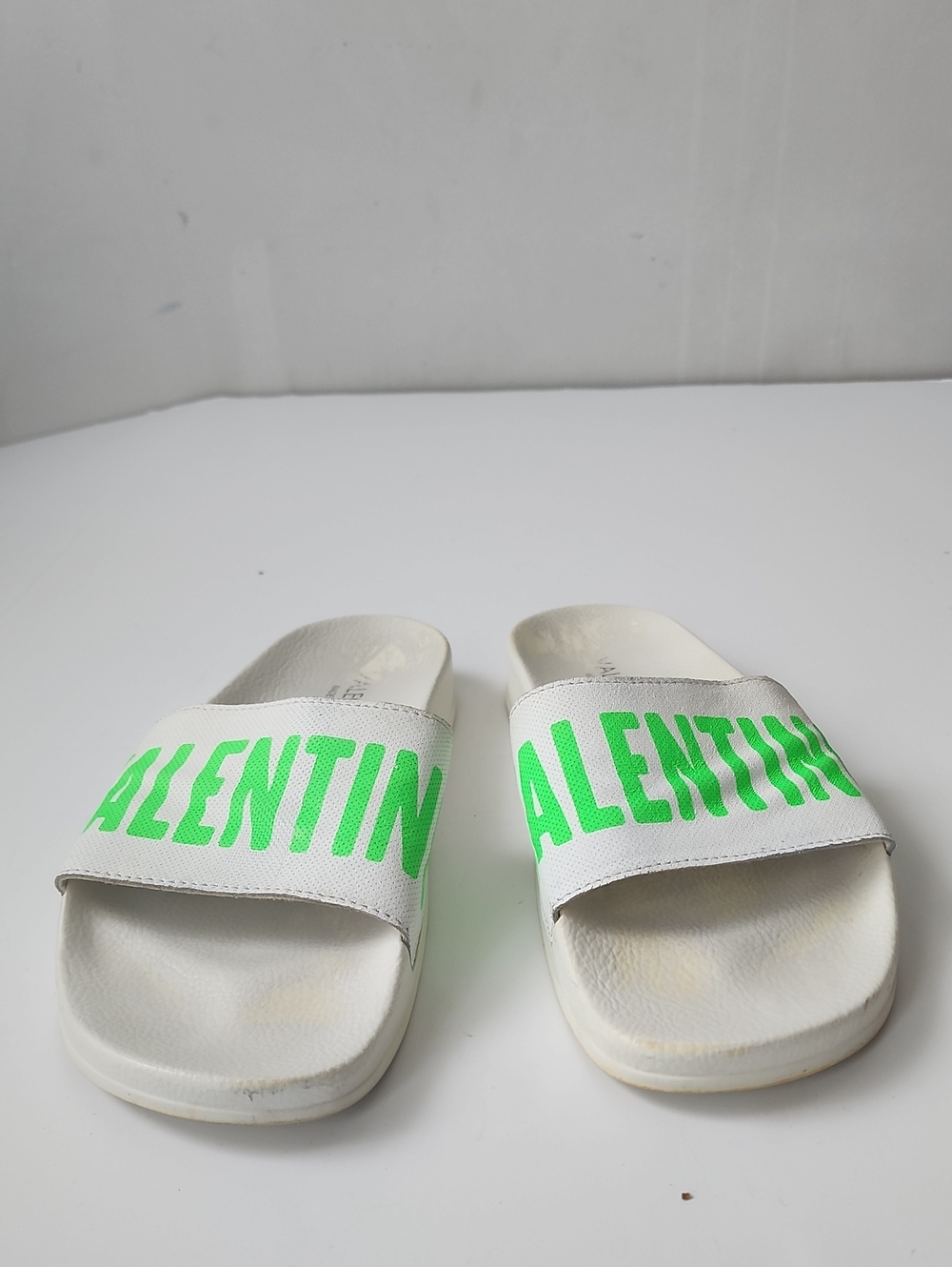 Valentino White Ladies Slide Sandals with Neon Green Logo Strap